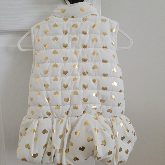 Puffer vests with two little bows in front. Size 24months. - Picture 4 of 4